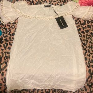 White off shoulder dress with tag from pretty little thing